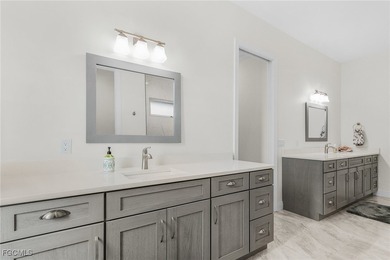 MAGNIFICENT CUSTOM BUILT, WATERFRONT HOME WITH 3,849 SQ FT OF on Palmetto-Pine Country Club in Florida - for sale on GolfHomes.com, golf home, golf lot