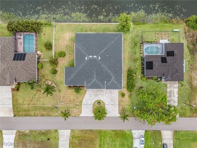 MAGNIFICENT CUSTOM BUILT, WATERFRONT HOME WITH 3,849 SQ FT OF on Palmetto-Pine Country Club in Florida - for sale on GolfHomes.com, golf home, golf lot