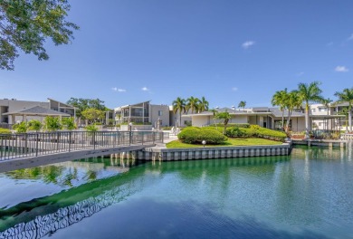 BEAUTIFULLY UPDATED FIRST FLOOR CORNER UNIT, PRIVATE & IDEALLY on BallenIsles Golf and Country Club in Florida - for sale on GolfHomes.com, golf home, golf lot