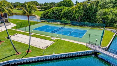 BEAUTIFULLY UPDATED FIRST FLOOR CORNER UNIT, PRIVATE & IDEALLY on BallenIsles Golf and Country Club in Florida - for sale on GolfHomes.com, golf home, golf lot