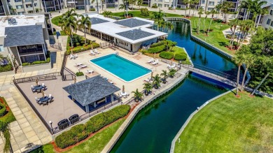 BEAUTIFULLY UPDATED FIRST FLOOR CORNER UNIT, PRIVATE & IDEALLY on BallenIsles Golf and Country Club in Florida - for sale on GolfHomes.com, golf home, golf lot