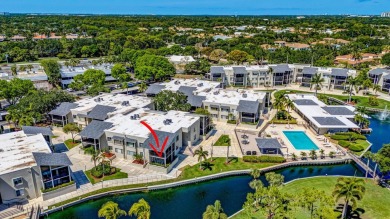 BEAUTIFULLY UPDATED FIRST FLOOR CORNER UNIT, PRIVATE & IDEALLY on BallenIsles Golf and Country Club in Florida - for sale on GolfHomes.com, golf home, golf lot