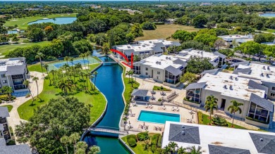 BEAUTIFULLY UPDATED FIRST FLOOR CORNER UNIT, PRIVATE & IDEALLY on BallenIsles Golf and Country Club in Florida - for sale on GolfHomes.com, golf home, golf lot