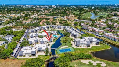 BEAUTIFULLY UPDATED FIRST FLOOR CORNER UNIT, PRIVATE & IDEALLY on BallenIsles Golf and Country Club in Florida - for sale on GolfHomes.com, golf home, golf lot