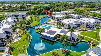 BEAUTIFULLY UPDATED FIRST FLOOR CORNER UNIT, PRIVATE & IDEALLY on BallenIsles Golf and Country Club in Florida - for sale on GolfHomes.com, golf home, golf lot