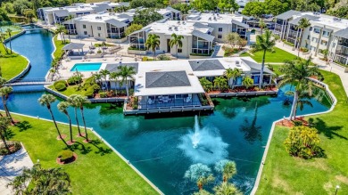 BEAUTIFULLY UPDATED FIRST FLOOR CORNER UNIT, PRIVATE & IDEALLY on BallenIsles Golf and Country Club in Florida - for sale on GolfHomes.com, golf home, golf lot