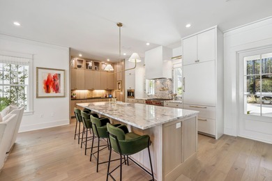 This Stunning 5-bedroom, 5.5-bath luxury residence overlooks the on Origins Golf Club in Florida - for sale on GolfHomes.com, golf home, golf lot