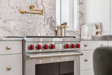 This Stunning 5-bedroom, 5.5-bath luxury residence overlooks the on Origins Golf Club in Florida - for sale on GolfHomes.com, golf home, golf lot