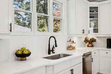 From the moment you pull up to this timeless Craftsman on one of on Charlie Yates Golf Course in Georgia - for sale on GolfHomes.com, golf home, golf lot