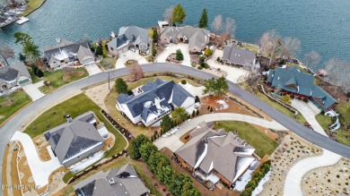 Discover the tranquil grace of this lake-view gem in the highly on Heatherhurst Golf Course in Tennessee - for sale on GolfHomes.com, golf home, golf lot