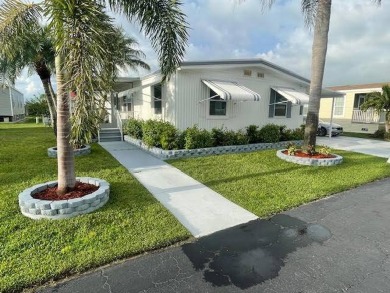 You must get here or call us about this uniquely renovated home on Royal Wood Golf and Country Club in Florida - for sale on GolfHomes.com, golf home, golf lot