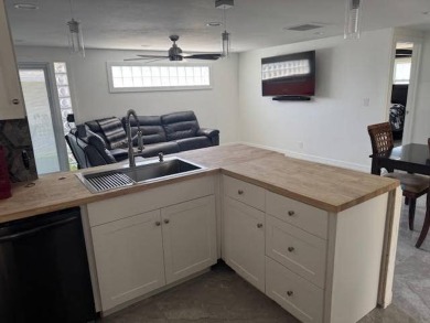 You must get here or call us about this uniquely renovated home on Royal Wood Golf and Country Club in Florida - for sale on GolfHomes.com, golf home, golf lot