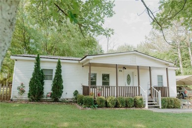 Check out this very welcoming home with a nice leveled front and on Nob North Golf Course in Georgia - for sale on GolfHomes.com, golf home, golf lot