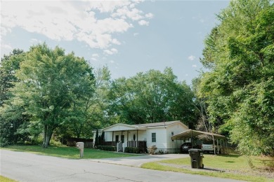 Check out this very welcoming home with a nice leveled front and on Nob North Golf Course in Georgia - for sale on GolfHomes.com, golf home, golf lot