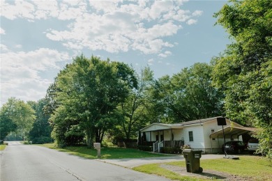 Check out this very welcoming home with a nice leveled front and on Nob North Golf Course in Georgia - for sale on GolfHomes.com, golf home, golf lot