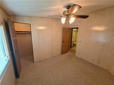 Perfect for seasonal home or rental opportunity! This spacious on Barefoot Bay Golf Course in Florida - for sale on GolfHomes.com, golf home, golf lot