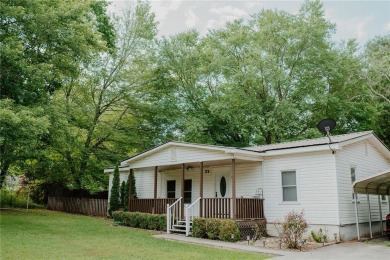 Check out this very welcoming home with a nice leveled front and on Nob North Golf Course in Georgia - for sale on GolfHomes.com, golf home, golf lot