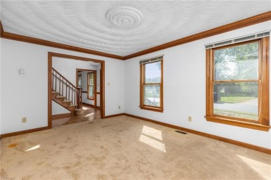 A rehab loan, your decorating ideas and some TLC is all that is on Chesapeake Golf Club in Virginia - for sale on GolfHomes.com, golf home, golf lot