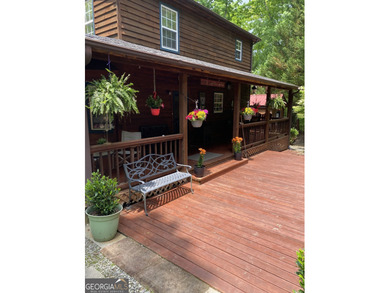 This refined mountain retreat delivers a rare combination of on Old Union Golf Course in Georgia - for sale on GolfHomes.com, golf home, golf lot