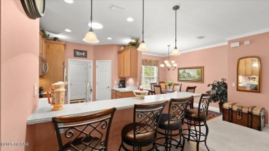 Step into this 3-bedroom, 2-bathroom fully furnished treasure in on LPGA International Golf Course in Florida - for sale on GolfHomes.com, golf home, golf lot