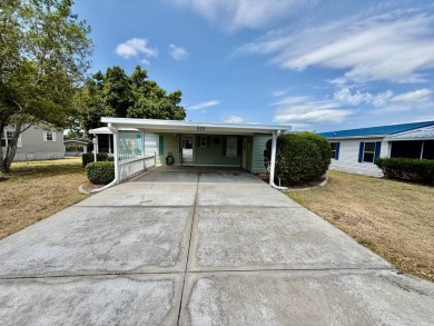 Home is located in Water Oak Country Club Estates in Lady Lake on Water Oak Country Club Estates in Florida - for sale on GolfHomes.com, golf home, golf lot