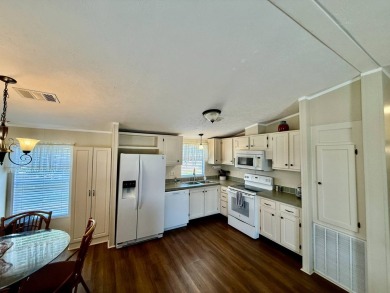 Home is located in Water Oak Country Club Estates in Lady Lake on Water Oak Country Club Estates in Florida - for sale on GolfHomes.com, golf home, golf lot