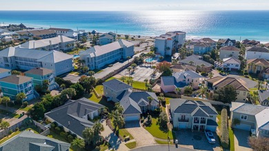 Coastal elegance meets effortless living at 196 Avalon Blvd in on Seascape Golf Course in Florida - for sale on GolfHomes.com, golf home, golf lot