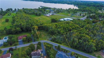 This lot is located in a premier neighborhood in the Finger on Owasco Country Club in New York - for sale on GolfHomes.com, golf home, golf lot