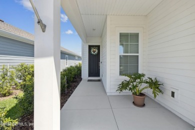 This beautifully designed 3-bedroom, 2-bath home sits on a on Golf Club At South Hampton in Florida - for sale on GolfHomes.com, golf home, golf lot