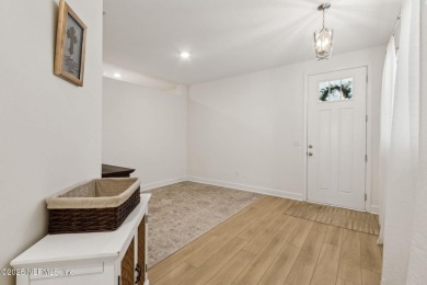 This beautifully designed 3-bedroom, 2-bath home sits on a on Golf Club At South Hampton in Florida - for sale on GolfHomes.com, golf home, golf lot