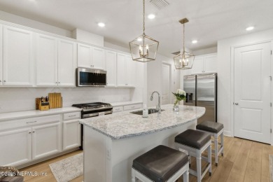 This beautifully designed 3-bedroom, 2-bath home sits on a on Golf Club At South Hampton in Florida - for sale on GolfHomes.com, golf home, golf lot