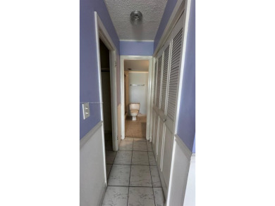 Location, location, location.  Two bedroom two bath condo in the on Fontainebleau Golf Course in Florida - for sale on GolfHomes.com, golf home, golf lot