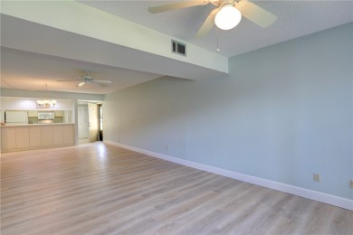Precious first-floor 2BD/2BA condo in a vibrant 55+ community on Vista Plantation Golf Club in Florida - for sale on GolfHomes.com, golf home, golf lot