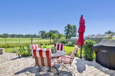 Light and bright showplace with expansive golf/green space views on The Golf Club of the Wharf in Alabama - for sale on GolfHomes.com, golf home, golf lot