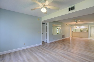 Precious first-floor 2BD/2BA condo in a vibrant 55+ community on Vista Plantation Golf Club in Florida - for sale on GolfHomes.com, golf home, golf lot