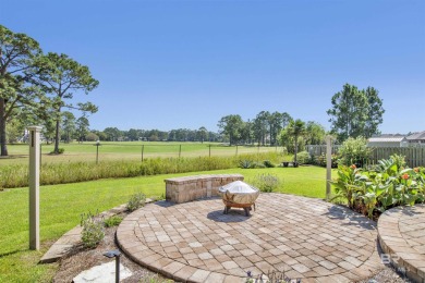 Light and bright showplace with expansive golf/green space views on The Golf Club of the Wharf in Alabama - for sale on GolfHomes.com, golf home, golf lot