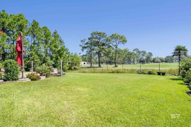 Light and bright showplace with expansive golf/green space views on The Golf Club of the Wharf in Alabama - for sale on GolfHomes.com, golf home, golf lot