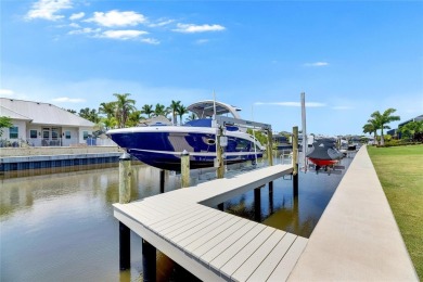 Under contract-accepting backup offers. 1028 Signet Drive on Apollo Beach Golf and Sea Club in Florida - for sale on GolfHomes.com, golf home, golf lot