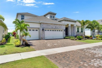 Under contract-accepting backup offers. 1028 Signet Drive on Apollo Beach Golf and Sea Club in Florida - for sale on GolfHomes.com, golf home, golf lot