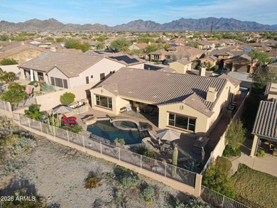 Experience elevated desert living in this exceptional TW Lewis on Estrella Mountain Ranch Golf Course in Arizona - for sale on GolfHomes.com, golf home, golf lot