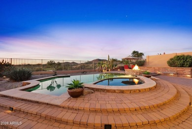 Experience elevated desert living in this exceptional TW Lewis on Estrella Mountain Ranch Golf Course in Arizona - for sale on GolfHomes.com, golf home, golf lot