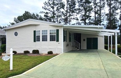 This home is on leased land, meaning buyers do not own the land on Big Cypress Golf and Country Club in Florida - for sale on GolfHomes.com, golf home, golf lot
