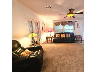 This home is on leased land, meaning buyers do not own the land on Big Cypress Golf and Country Club in Florida - for sale on GolfHomes.com, golf home, golf lot