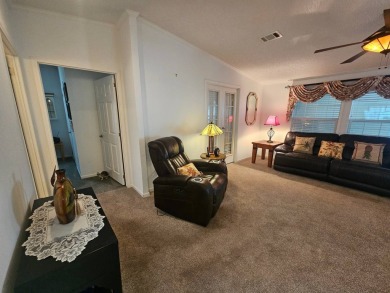 This home is on leased land, meaning buyers do not own the land on Big Cypress Golf and Country Club in Florida - for sale on GolfHomes.com, golf home, golf lot