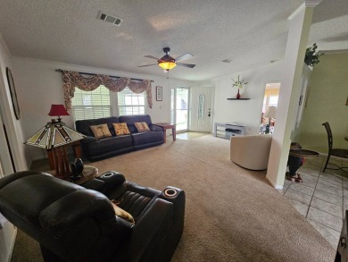 This home is on leased land, meaning buyers do not own the land on Big Cypress Golf and Country Club in Florida - for sale on GolfHomes.com, golf home, golf lot