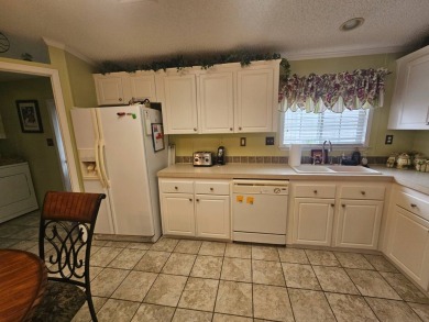 This home is on leased land, meaning buyers do not own the land on Big Cypress Golf and Country Club in Florida - for sale on GolfHomes.com, golf home, golf lot