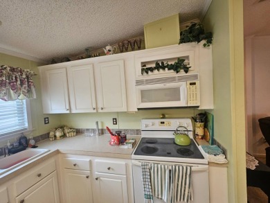 This home is on leased land, meaning buyers do not own the land on Big Cypress Golf and Country Club in Florida - for sale on GolfHomes.com, golf home, golf lot