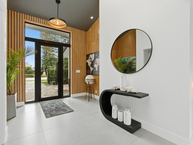 Exceptional modern residence fully renovated with a 1,700 - on Seagate Country Club in Florida - for sale on GolfHomes.com, golf home, golf lot