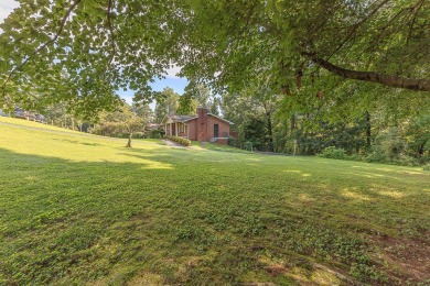 This all brick rancher with a finished basement is only minutes on Concord Golf Club in Tennessee - for sale on GolfHomes.com, golf home, golf lot