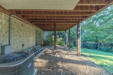 This all brick rancher with a finished basement is only minutes on Concord Golf Club in Tennessee - for sale on GolfHomes.com, golf home, golf lot
